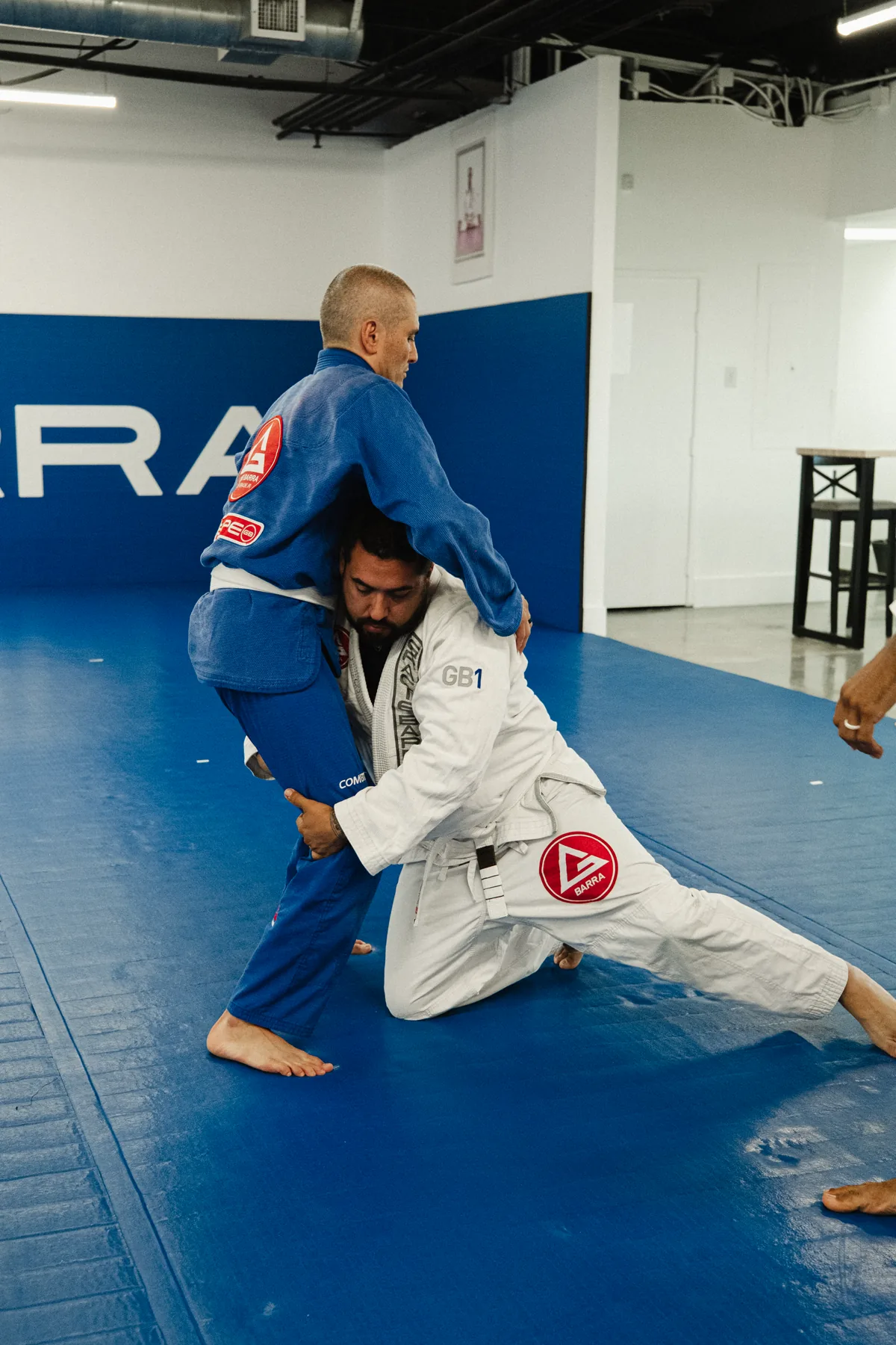 Students practicing Jiu-Jitsu at Gracie Barra Aliso Viejo